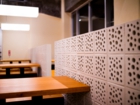 LSD design co., ltd.Yushinmi,2014,izakaya,Okinawa, Japan,Interior design,ornamental block, Okinawan Food, concrete floor ,simple, partitionwood, counter